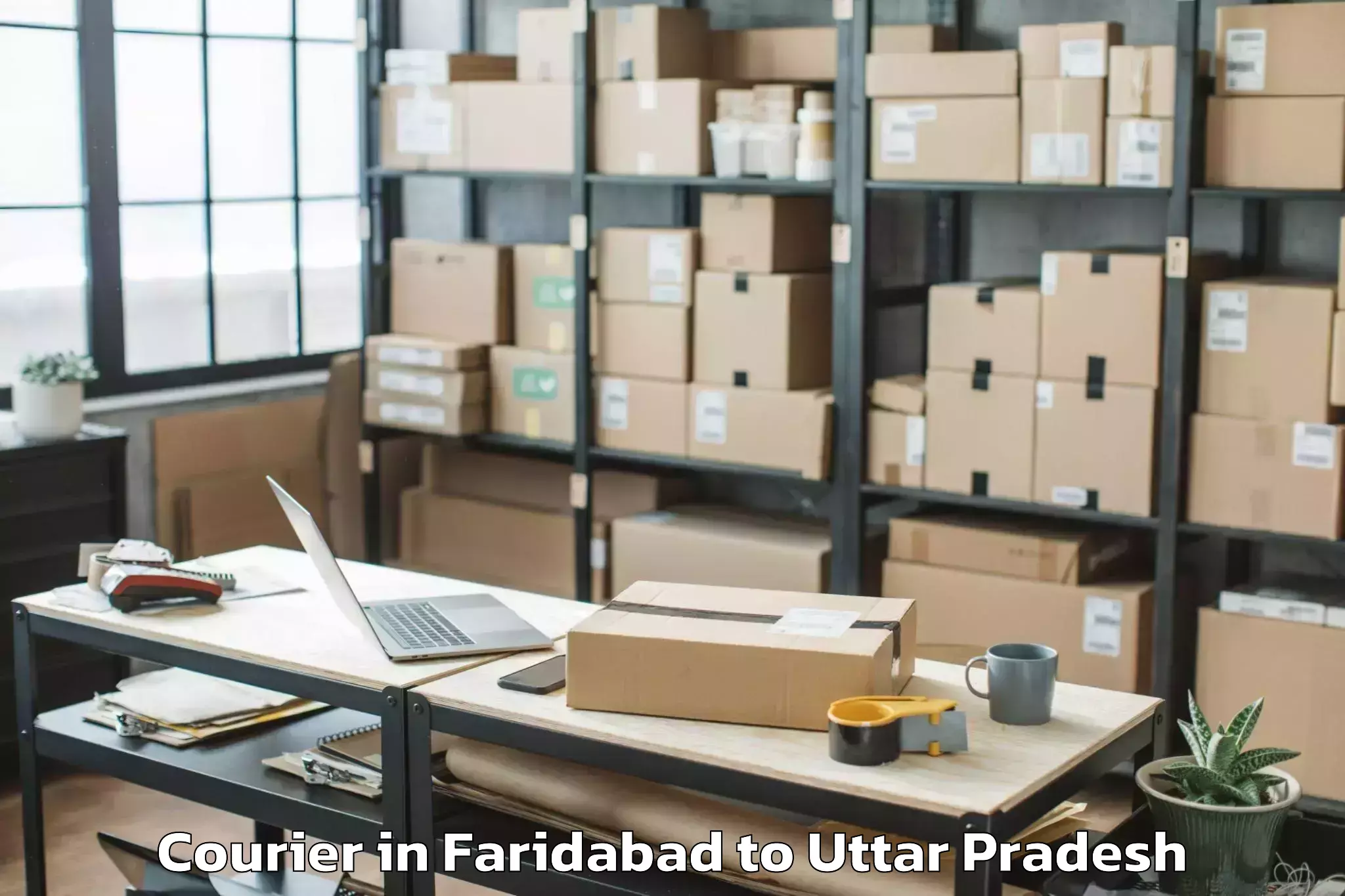 Top Faridabad to Mau Courier Available